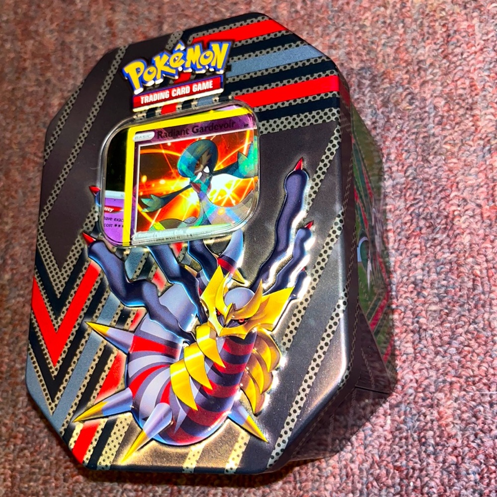 A Pokémon tin and over 300 rare and uncommon Pokémon cards.